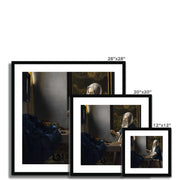 Woman Holding a Balance Framed & Mounted Print