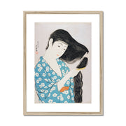 Woman Combing Her Hair Framed & Mounted Print