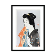 Woman Holding a Hand Towel Framed & Mounted Print