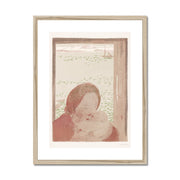 Mother with baby in front of a window Framed & Mounted Print