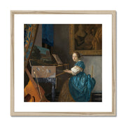 Young Woman Seated at a Virginal Framed & Mounted Print