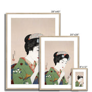 Woman Applying Rouge Framed & Mounted Print